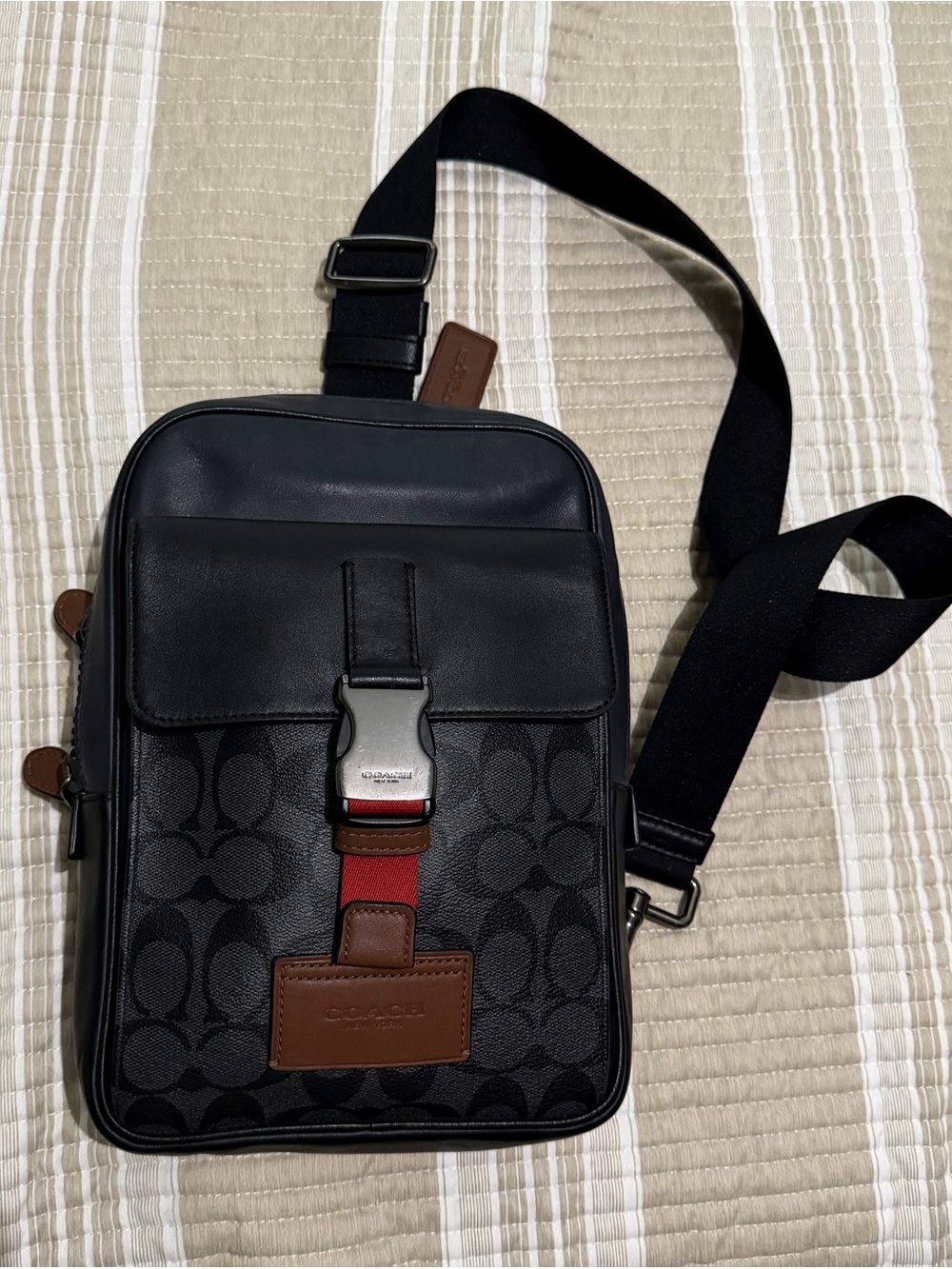 Coach Black Signature Crossbody Sling with Brown Trim and Red Accent